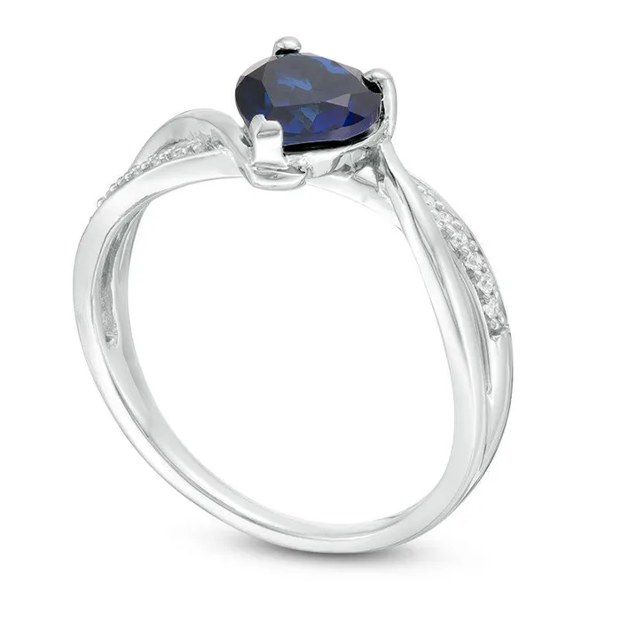 60mm HeartShaped LabCreated Blue Sapphire and 005 CT TW Diamond Crossover Bypass Promise Ring in Sterling Silver Goldia Rings 60mm HeartShaped LabCreated Blue Sapphire and 005 CT TW Diamond Crossover Bypass Promise Ring in Sterling Silver Goldia Rings