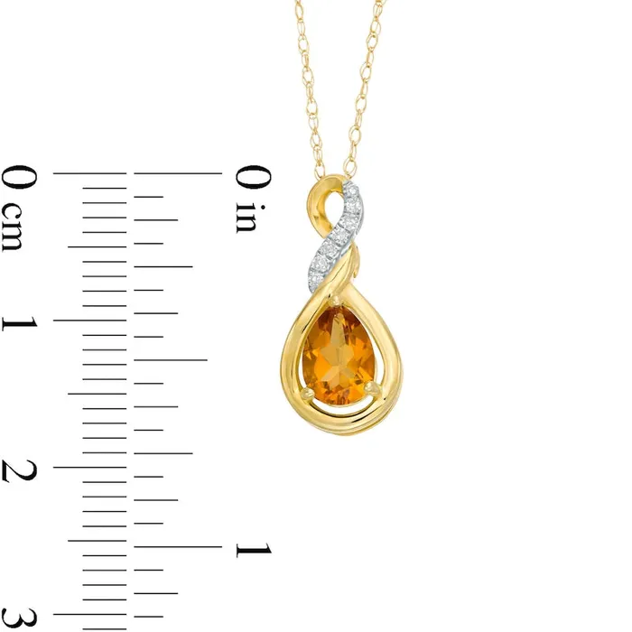 Goldia Necklaces PearShaped Citrine and Natural Diamond Accent Cascading Teardrop Pendant in 10K Yellow Gold Goldia Necklaces PearShaped Citrine and Natural Diamond Accent Cascading Teardrop Pendant in 10K Yellow Gold