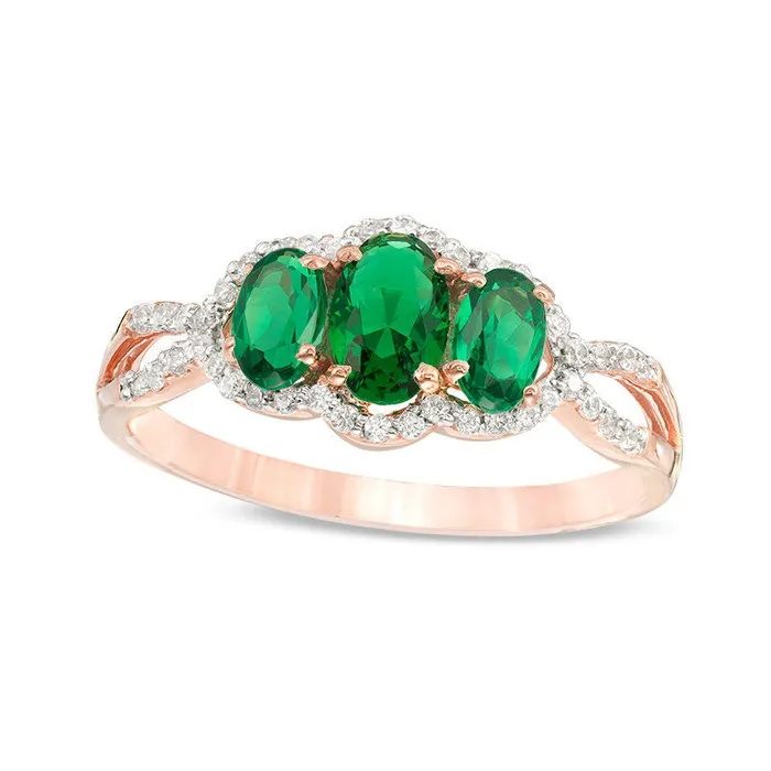 Oval LabCreated Emerald and 017 CT TW Diamond Frame Three Stone Engagement Ring in Solid 10K Rose Gold Goldia Rings Oval LabCreated Emerald and 017 CT TW Diamond Frame Three Stone Engagement Ring in Solid 10K Rose Gold Goldia Rings